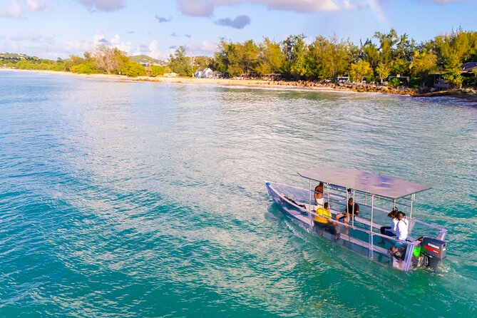 Reef Explorers Transparent Boat and Beach Tour - Stop 3: Deep Bay Beach for swimming and snorkeling