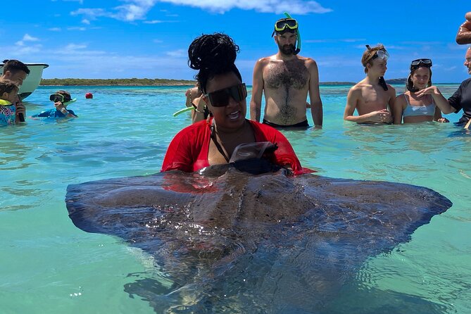 Stingray City Experience Antigua - Cruise Ship Passengers Edition - Entering the water with help from the guides